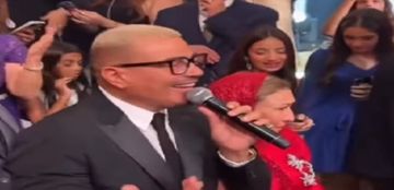 سيدة مسنة اقتحمت حفل عمرو دياب!