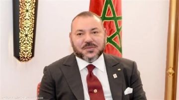 الملك محمد السادس يهنئ منتخب المغرب الفائز بمونديال الشباب الملك محمد السادس يهنئ منتخب المغرب الفائز بمونديال الشباب