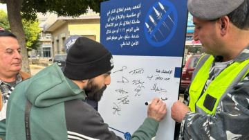 بالصور: تعهد من سكان الضاحية لعدم إطلاق النار في الهواء