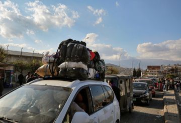 عائلات سورية لاجئة في لبنان تعود بشكل طوعي إلى بلادها (فيديوهات)