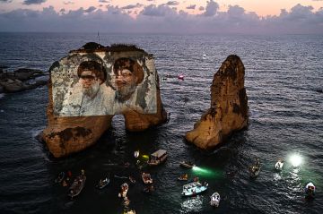 لبنان.. سلام يلغي مواعيده اعتراضا على إضاءة صخرة الروشة بصورة نصر الله