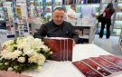 الأب بوعبود وقع كتابه البطريرك الدويهي: منارة ليتورجية في معرض بيروت الدولي للكتاب - lb