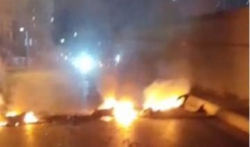 بالفيديو قطع أوتوستراد الملولة في طرابلس بالإطارات المشتعلة بالفيديو قطع أوتوستراد الملولة في طرابلس بالإطارات المشتعلة