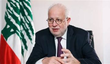 وزير العدل: على حزب الله تسليم سلاحه