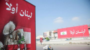 صراع اللافتات والصور مرآة لموازين القوى صراع اللافتات والصور مرآة لموازين القوى