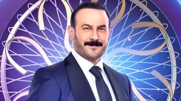 قصي خولي يتأثر بلقاء متسابق من ذوي الهمم في من سيربح المليون
