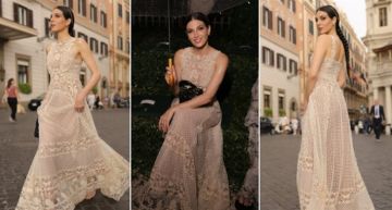 رزان جمال بفستان الكروشيه في جلسة تصوير بشوارع روما