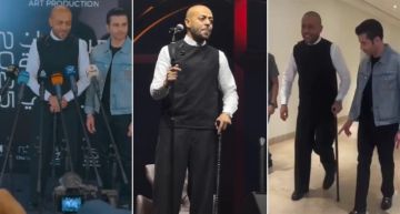 تامر عاشور بالعكاز في الكويت بأول حفل له بعد عملية الرباط الصليبي