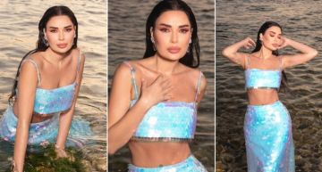 سيرين عبد النور بفستان قطعتين لامع على البحر ... تشبه عروسة البحر