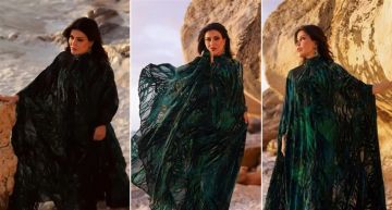 جومانا مراد حافية القدمين في جلسة تصوير على شاطئ البحر