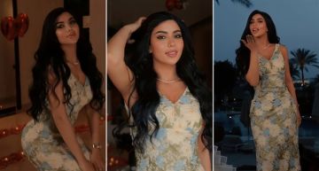 بفستان وردي وباقة كبيرة من الأزهار كارولين عزمي تخطف الأنظار في جلسة تصوير احتفالا بعيد ...