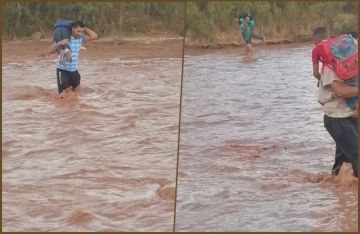 آباء يحملون أبنائهم لعبور الوادي.. مطالب ببناء قناطر على وادي دادس نواحي ورزازات