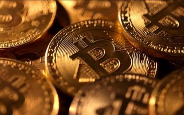 البيتكوين تقترب من 66 ألف دولار بدعم تراجع التوترات والنفط