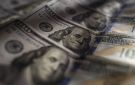 الدولار يتراجع بعد تباطؤ التضخم وترقب قرار الفيدرالي سبتمبر المقبل