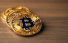 البيتكوين يتراجع دون 78 ألف دولار