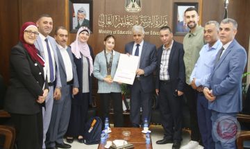 برهم يكرم بطلة آسيا في رياضة المواي تاي