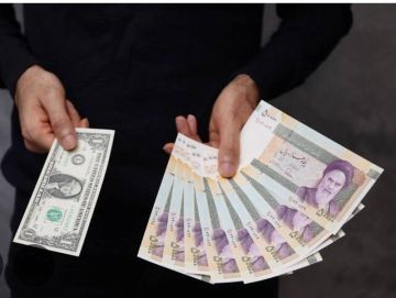 الريال الإيراني يهبط لمستويات قياسية جديدة أمام الدولار الريال الإيراني يهبط لمستويات قياسية جديدة أمام الدولار