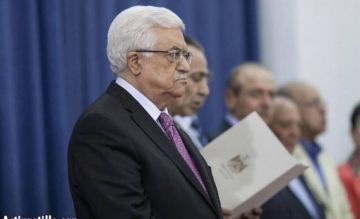 عباس يدافع عن المجدلاني ويؤكد من جديد على إلغاء قانون مخصصات الأسرى 