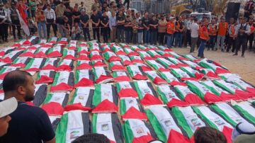 جنازة بعد 3 سنوات.. رفات ١٠٥ شهداء قضوا بمجزرة التاج يعود إلى أحضان التراب جنازة بعد 3 سنوات.. رفات ١٠٥ شهداء قضوا بمجزرة التاج يعود إلى أحضان التراب