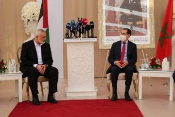 لقاء هنية بالعثماني يثير الجدل