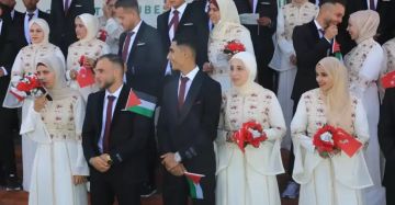 بالصور بالصور: عرس جماعي لـ50 عريس وعروس من أبناء الشهداء في غزة