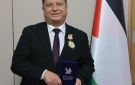 تكريم السفير عواد بوسام سفير السلام خلال مهرجان حديقة السلام في بكين