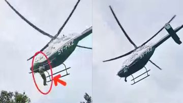 شاب يتمسك بطائرة هليكوبتر لحظة إقلاعها في حفل زفاف.. فيديو