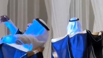 عريس يرقص فرحا بعد رؤية عروسه بفستان الزفاف .. فيديو عريس يرقص فرحا بعد رؤية عروسه بفستان الزفاف .. فيديو
