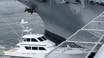حادث تصادم بين سفينة صيد وحاملة طائرات أمريكية والقبض على قائدها مخمورا .. فيديو
