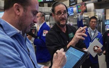 تراجع الأسهم الأمريكية بختام تعاملات الأسبوع وتتجه لتحقيق مكاسب شهرية