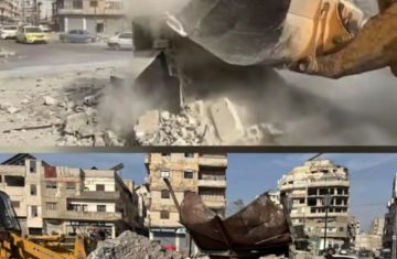 إزالة دوار الحفيان في حمص بعد أقل من ساعة على إعلان إنجازه وسط انتقادات للتصميم إزالة دوار الحفيان في حمص بعد أقل من ساعة على إعلان إنجازه وسط انتقادات للتصميم