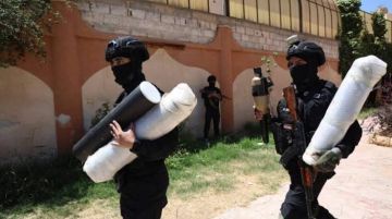 السلطات العراقية تعتقل شخصين بتهمة تهريب أسلحة إلى سوريا