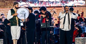 أكثر من 100 كمان وعوامرية سيدي عامر يفتتحون الدورة الـ 53 لمهرجان المنستير الدولي أكثر من 100 كمان وعوامرية سيدي عامر يفتتحون الدورة الـ 53 لمهرجان المنستير الدولي
