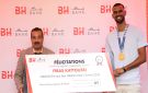 بنك الإسكان يحتفي بالبطل فراس القطوسي وتكرم إنجازه