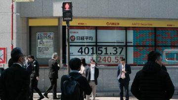 انخفاض الأسواق العالمية في بداية ضعيفة لديسمبر