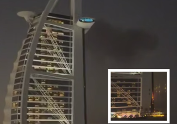 لفطات تظهر حريقا في فندق برج العرب بدبي بعد إصابته بمسيرة إيرانية (فيديوهات)