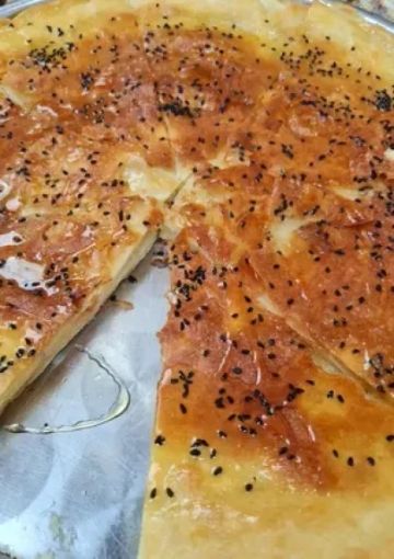 هل تعلم أن بنت الصحن ليست مجرد حلوى، بل هي اختبار لمهارة ربة البيت في عدد طبقات العجين؟ كم طبقة تصل إليها المحترفات؟ هل تعلم أن بنت الصحن ليست مجرد حلوى، بل هي اختبار لمهارة ربة البيت في عدد طبقات العجين؟ كم طبقة تصل إليها المحترفات؟