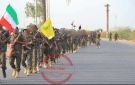 شاهد بالصورة فصائل من حزب الله تستعرض في اليمن