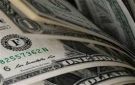 الدولار يستقر قرب أدنى مستوياته
